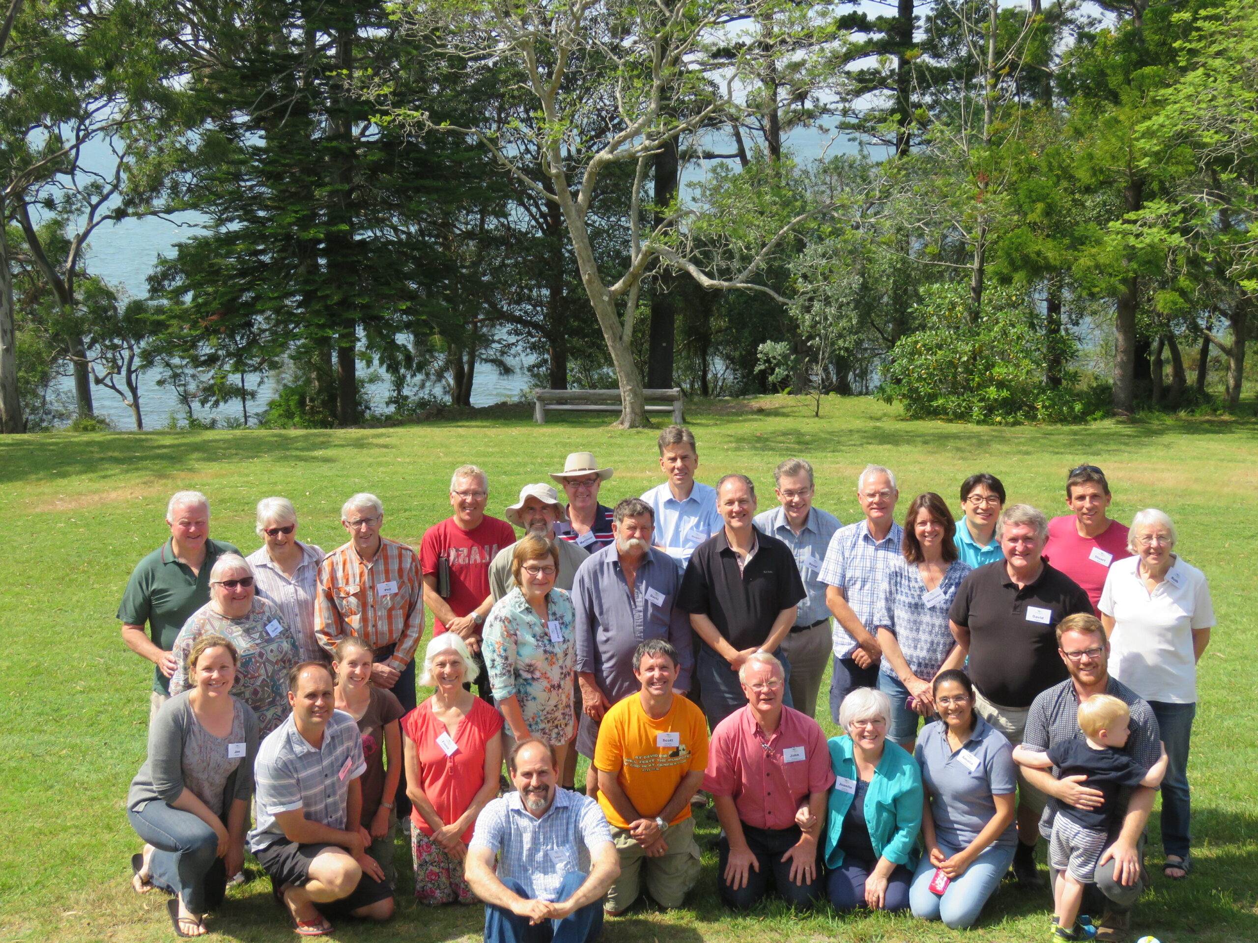 Photo of attendees at the formative A Rocha Australia gathering at Tahlee in Spring 2015, overlooking the shoreline.